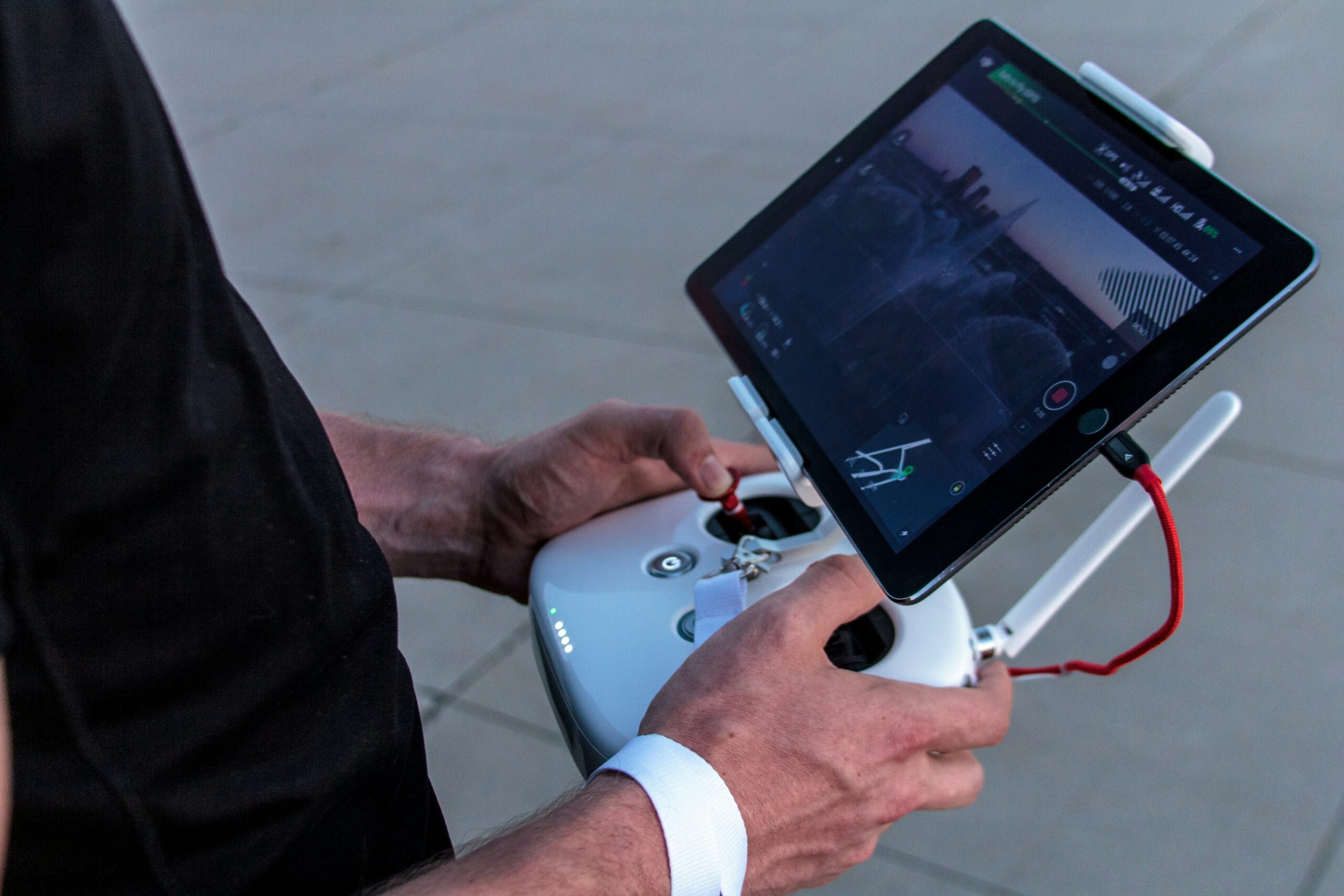 Person holding drone remote controller