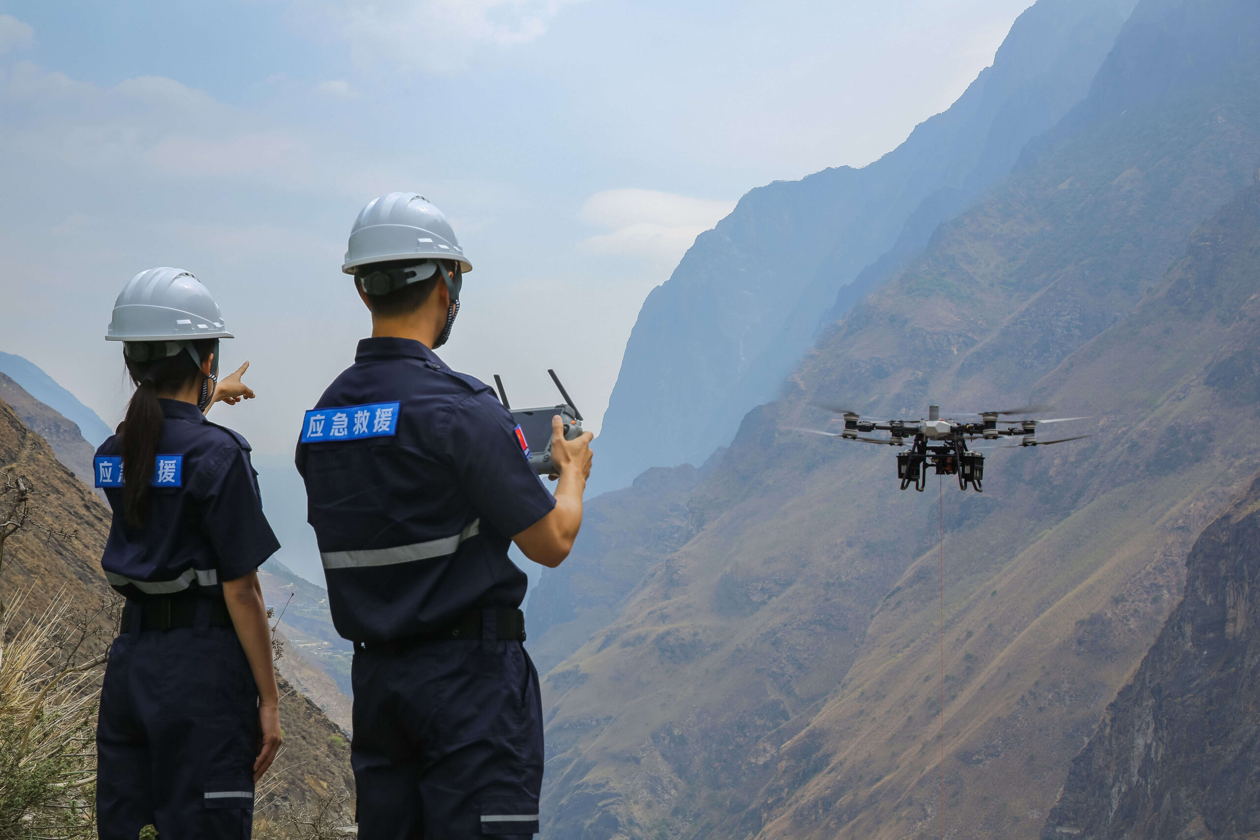 Team operating DJI FlyCart 100 heavy duty delivery drone